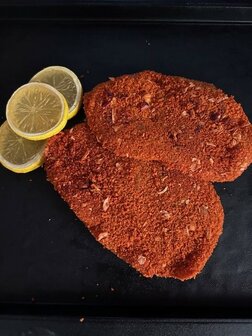 Kipschnitzel zigeunerpaneer. Prijs per 175 gram